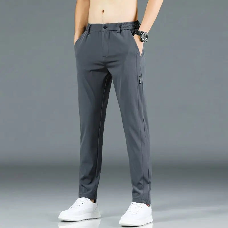 Ice silk men's pants 2025 summer new black gray thin business casual pants outdoor elastic breathable straight leg sports pants